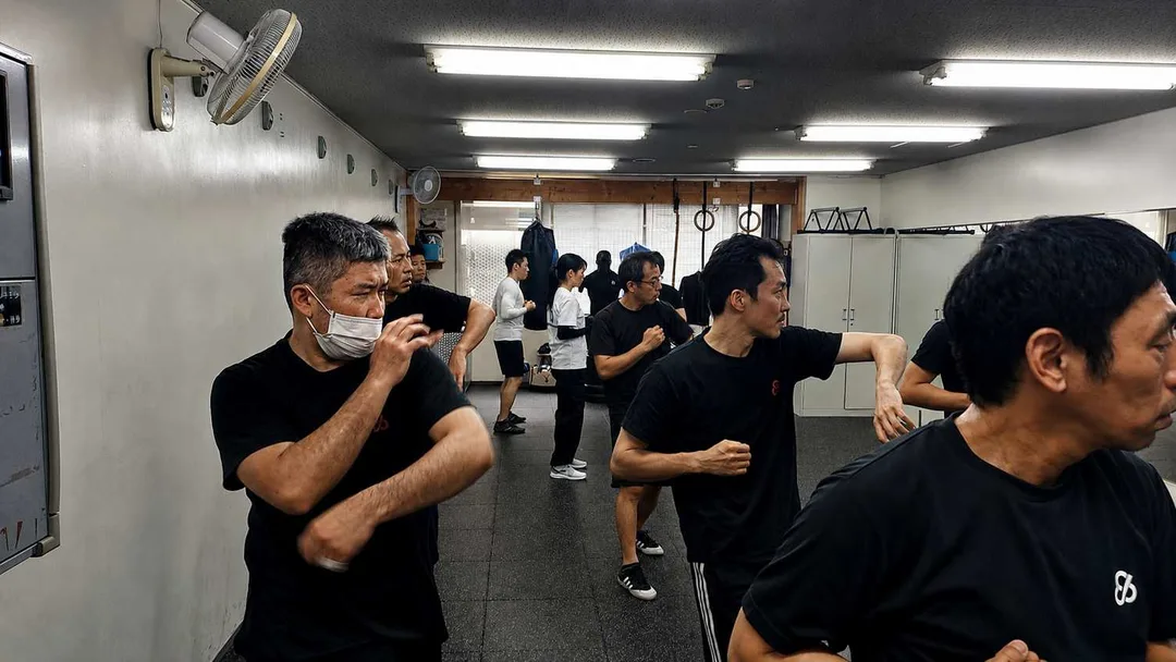 students practicing the chum kiu form at J's GYM Japan