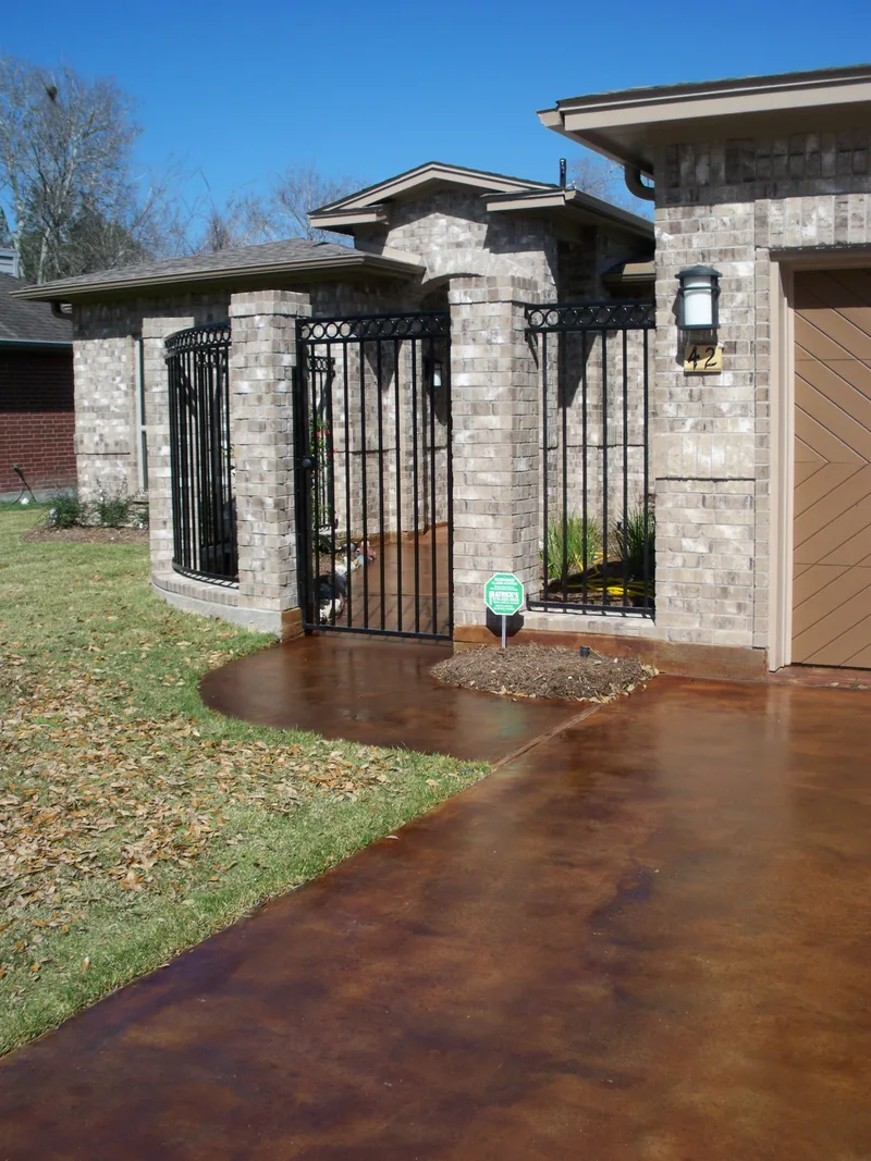Green and Black Stained Concrete Patio