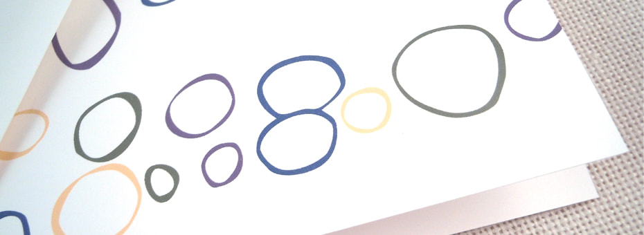 Cropped image of the front of the Hand Drawn Color Outlined Circles Any Occasion A6 Greeting Card. Hand drawn circles in colors of army green, purple, yellow, and blue.