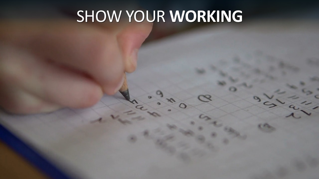 A close-up of a hand writing handwritten maths workings with a pencil on grid paper, numbers and calculations visible mid-solution, beneath bold white headline text reading "Show Your Working" with "WORKING" emphasised in heavier type.