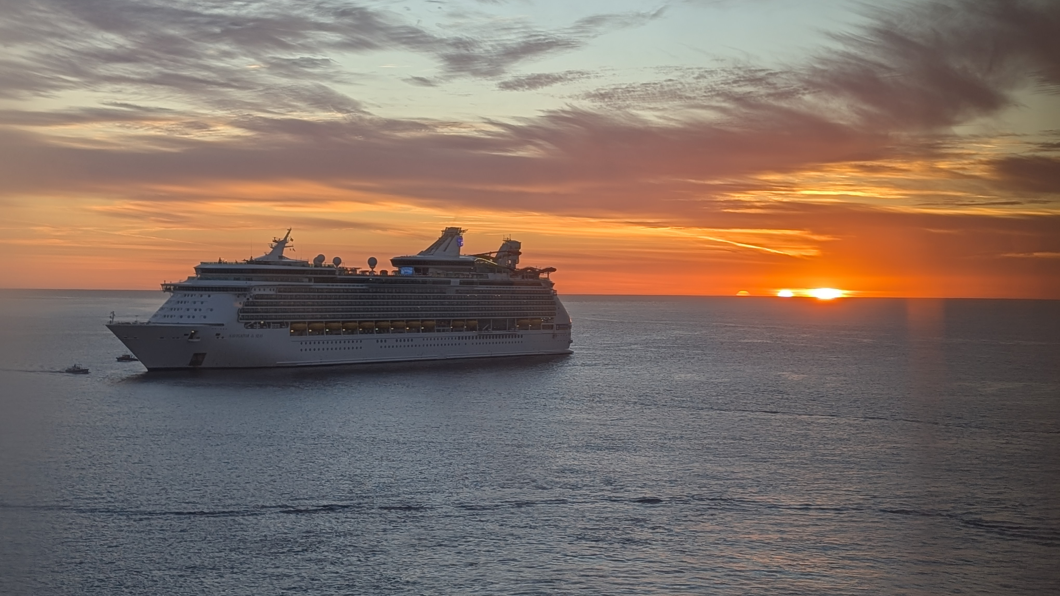 A cruise ship at sunset