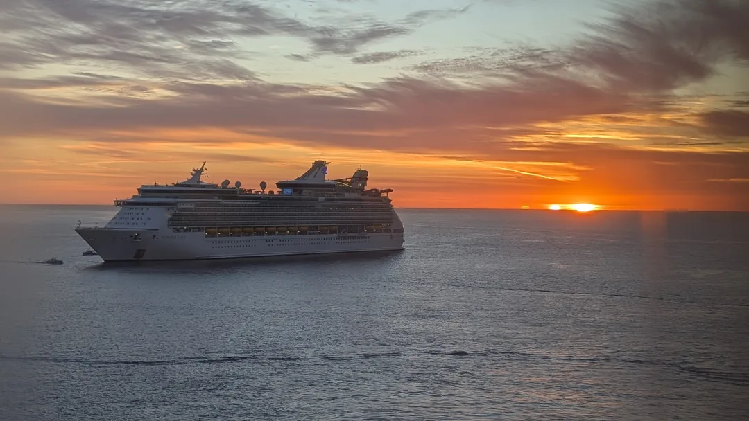 A cruise ship at sunset