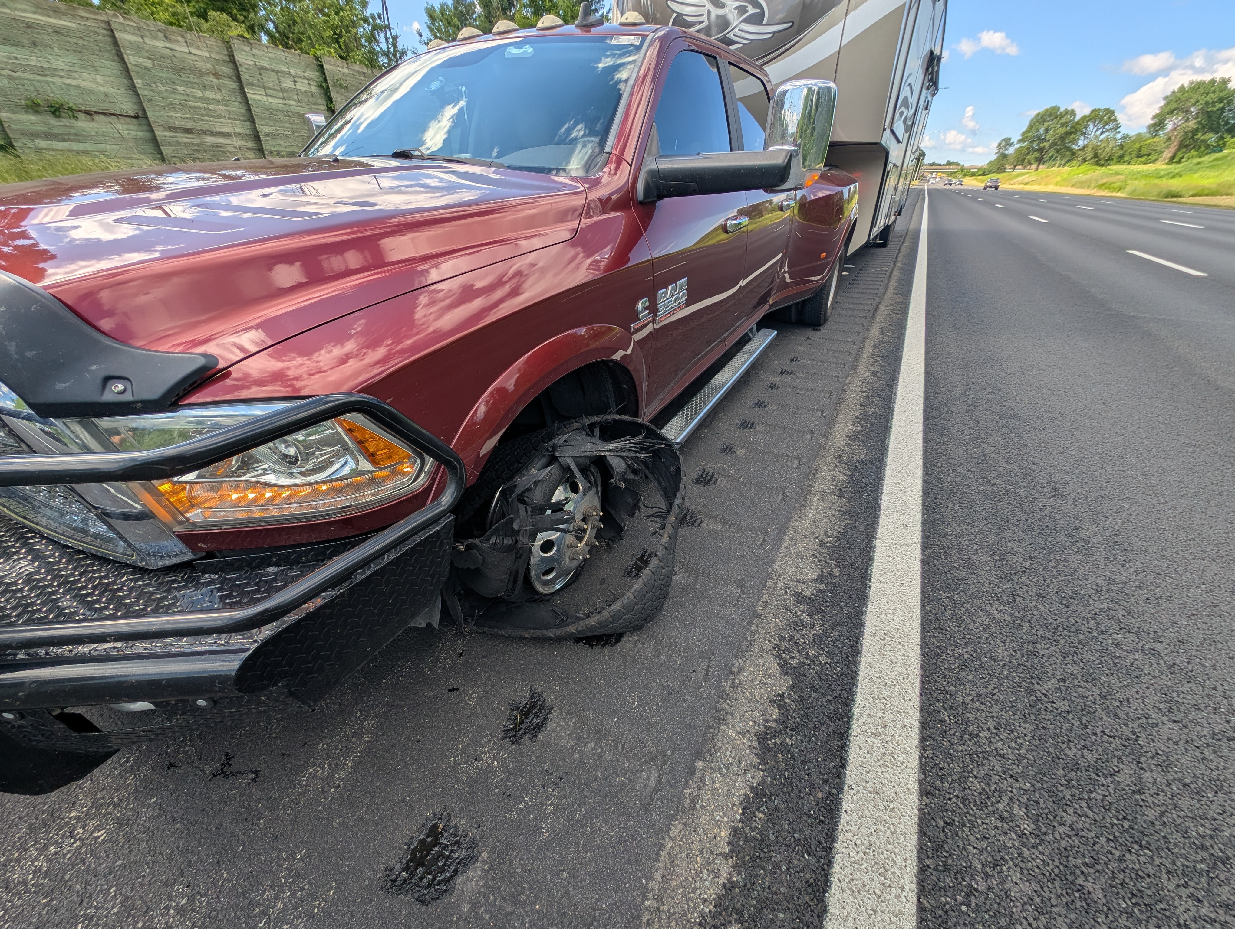 Gulliver has a blowout on the freeway