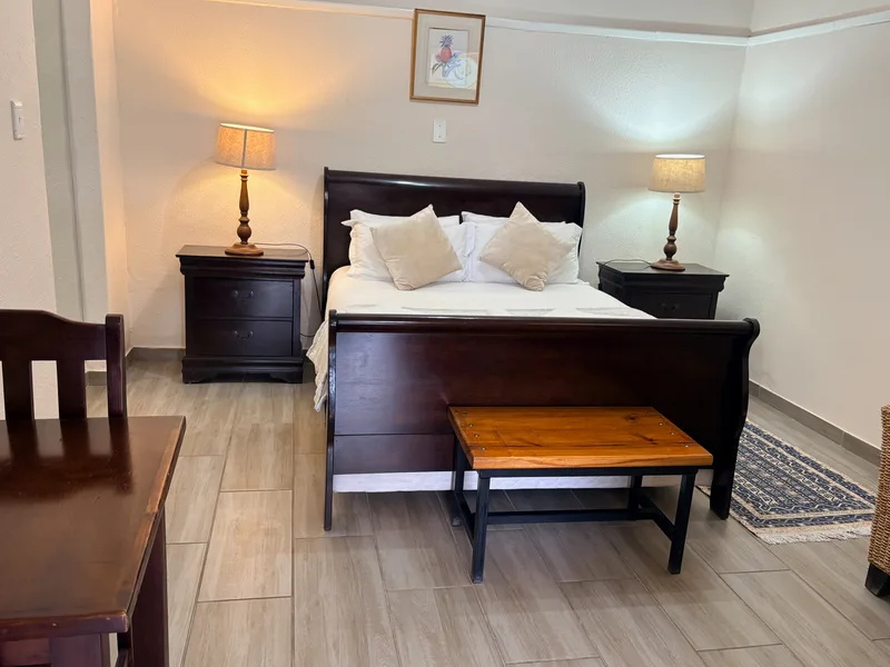 Queen size bed in Room 6 at the Solomon Edwardian Guest House