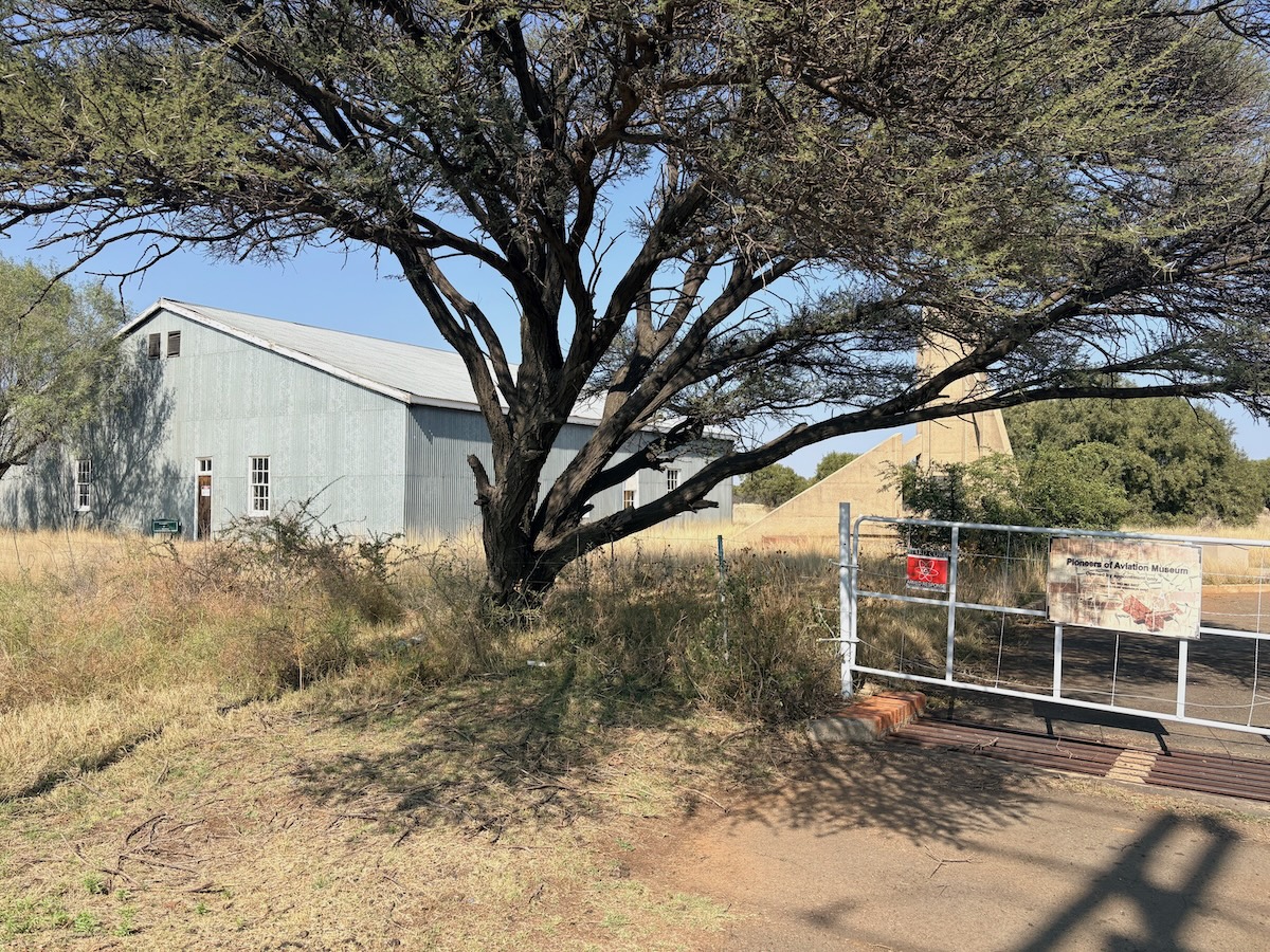 Pioneers of Aviation Museum hangar at Alexandersfontein outside Kimberley, viewed from the gravel access road. 