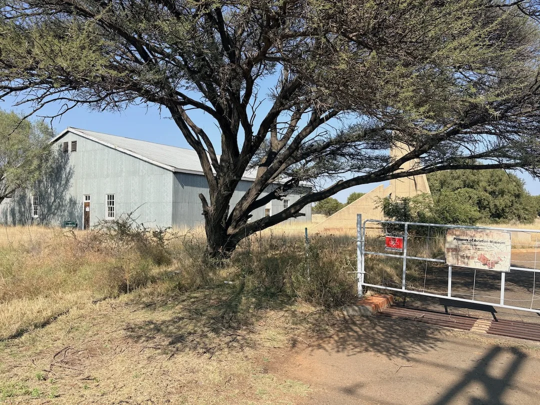 Pioneers of Aviation Museum hangar at Alexandersfontein outside Kimberley, viewed from the gravel access road. 
