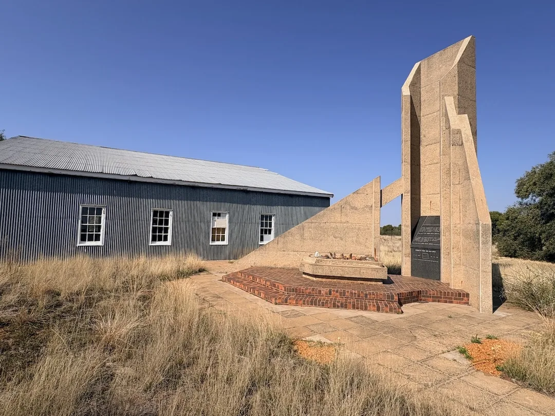 Reconstructed flying school hangar and aviation memorial at the Pioneers of Aviation Museum, Alexandersfontein.