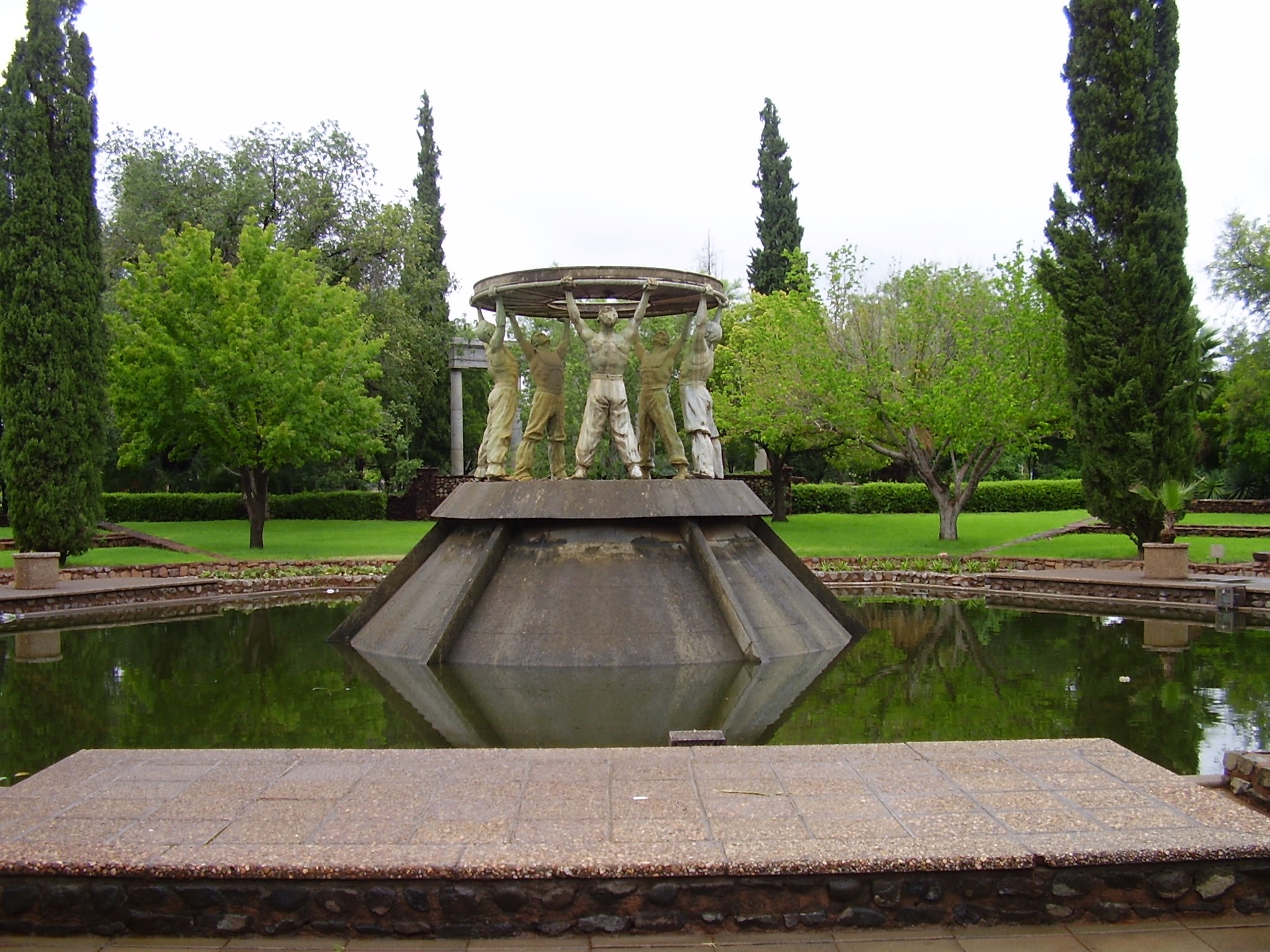 Diggers Fountain in the Ernest Oppenheimer Memorial Gardens in Kimberley, showing the original bronze diamond sieve.