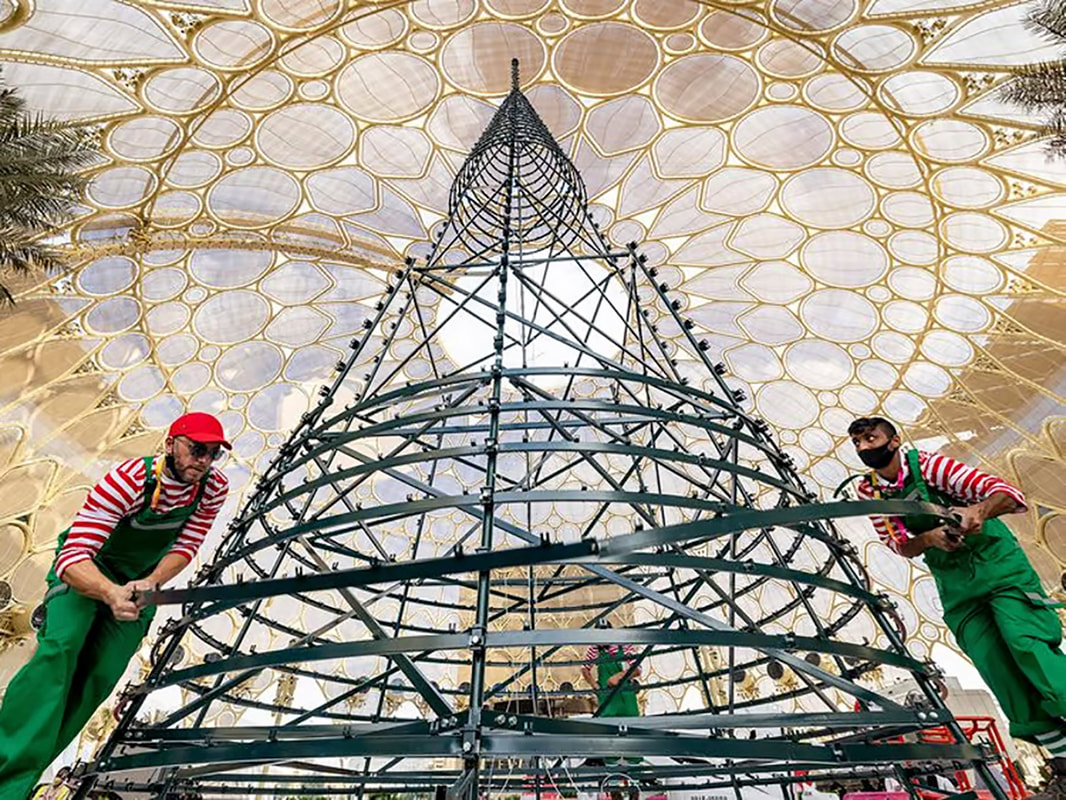 Scenic event installation under construction with temporary framework and production infrastructure