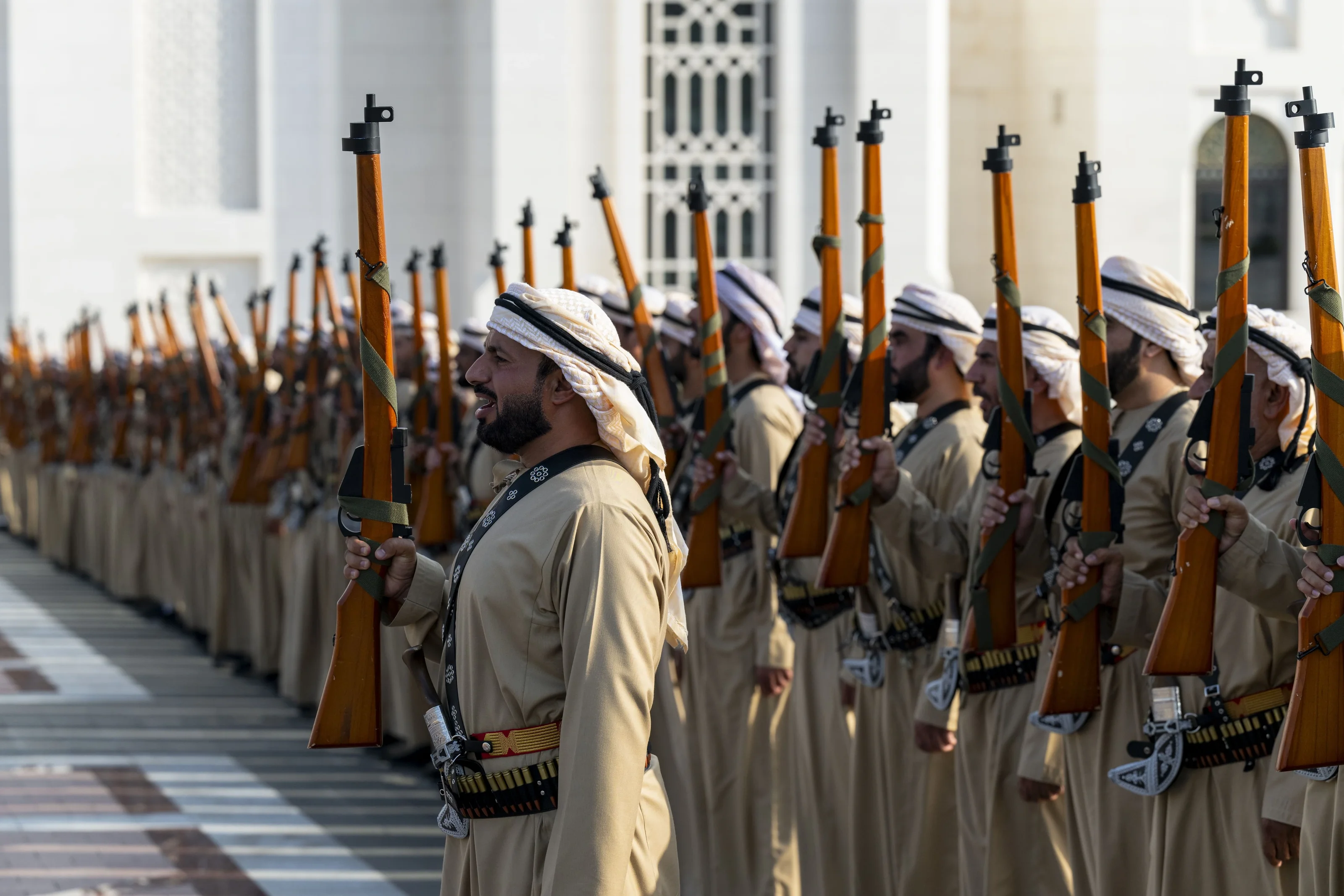 Traditional ceremonial rifle guard during the Oman State Reception at Qasr Al Watan