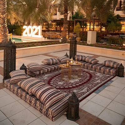 outdoor-arabian-majlis-striped-cushions-lanterns