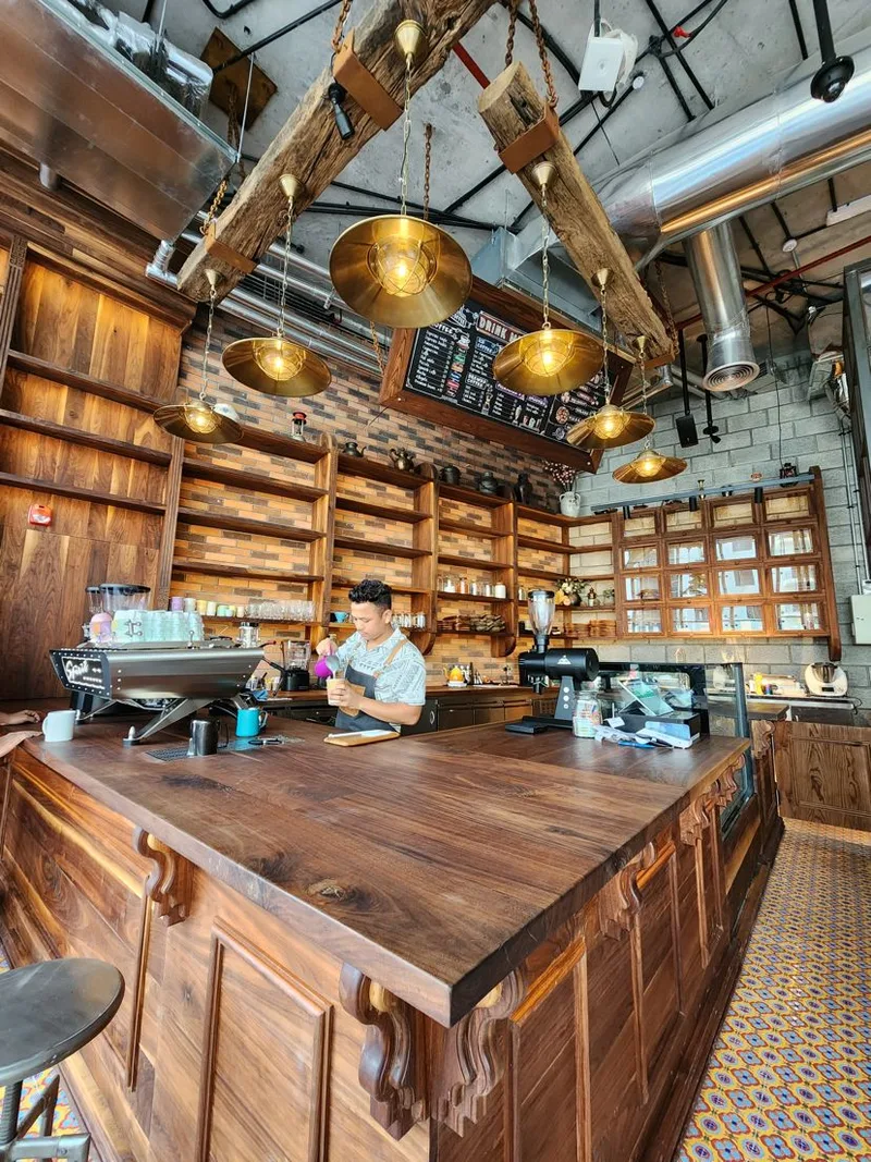 coffee-shop-wooden-counter-barista.webp