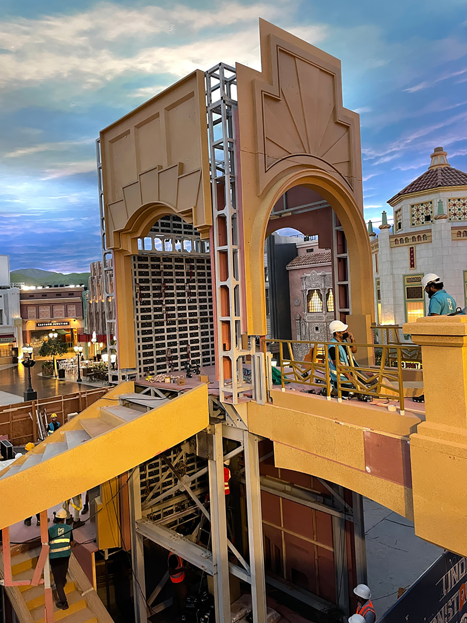 Modular scenic frame positioned using locating pins and captive connection bolts.
