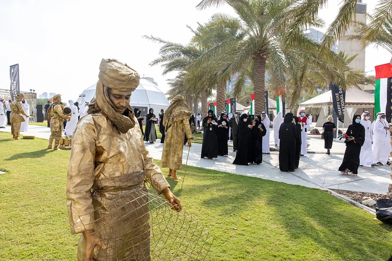 Large freestanding hashtag scenic signage installed for the ADNOC Jubilee Festival.