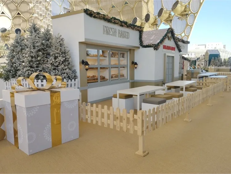 Large-scale GRP bauble installation forming a festive scenic focal point.
