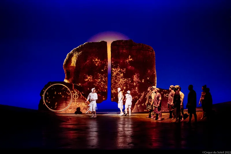 Large-scale scenic rock rotated to create a changing stage composition in Riyadh.