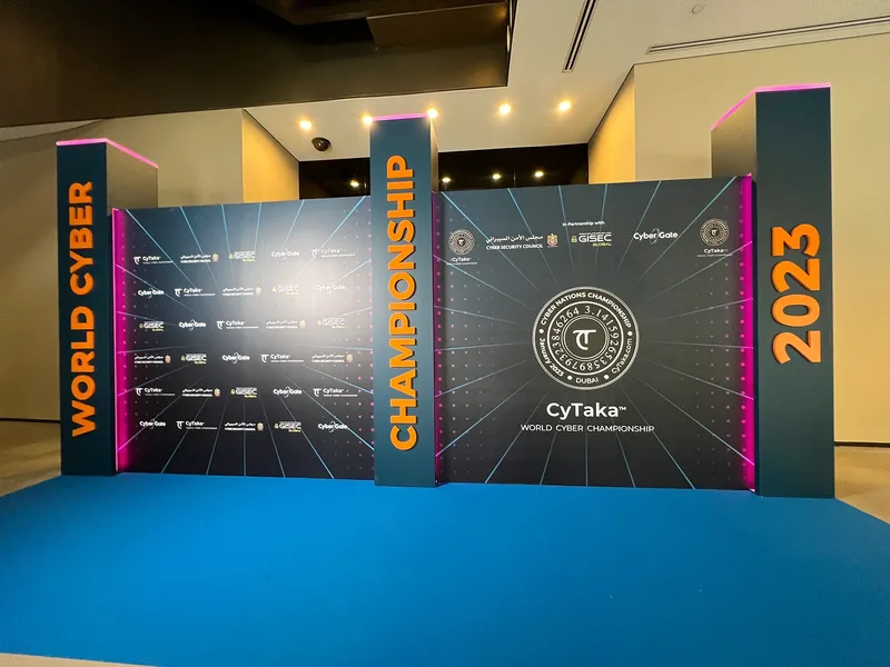Evolution Scenic branded scenic backdrop with MDF cladding and printed sponsor graphics in Dubai.