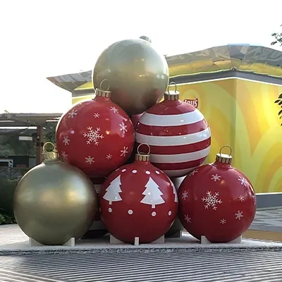 Clustered Christmas baubles restored with red, gold, striped and snowflake finishes