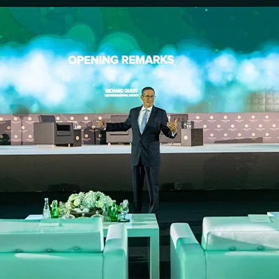 Black scenic architecture framing the venue LED display at Global Citizen Forum.