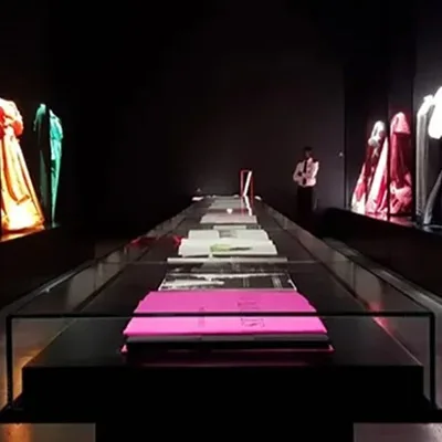Custom scenic walls and exhibition structures manufactured for a luxury fashion exhibition.