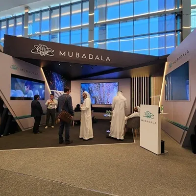 Evolution Scenic exhibition frontage combining metal framing, MDF cladding and integrated content screens.