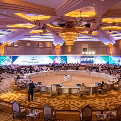 Evolution Scenic branded stage and angled graphic walls for the UAE Regional Climate Dialogue.