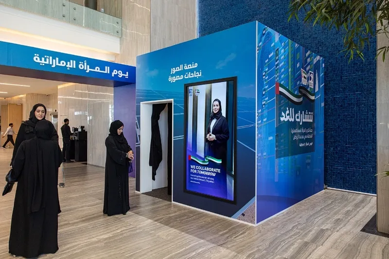 Evolution Scenic interactive photo booth with integrated screen and blue vinyl finish.