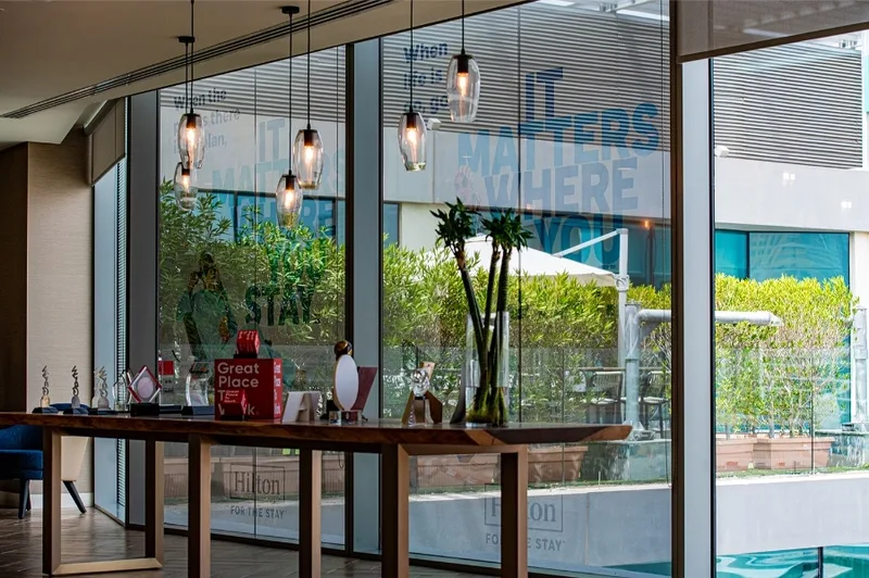 Branded promotional display in Hilton hotel lobby