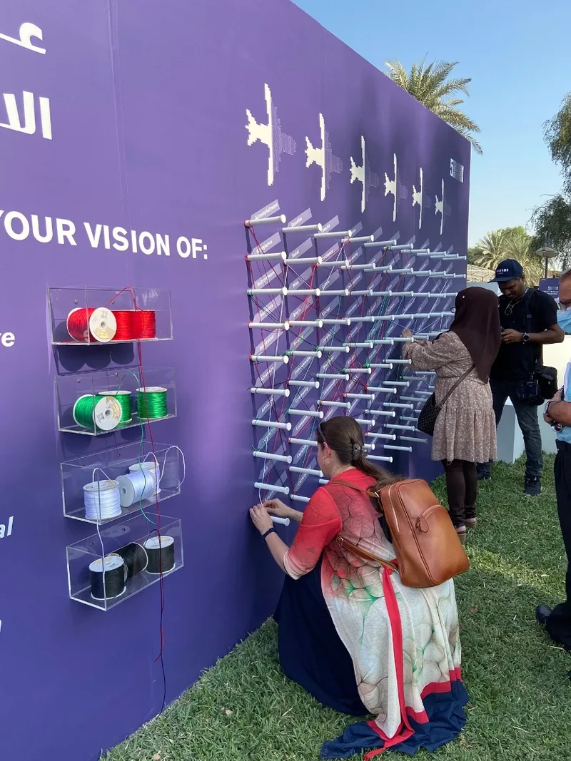 installation-01.png Interactive thread-wall installation fabricated by Evolution Scenic for the Abu Dhabi activation.