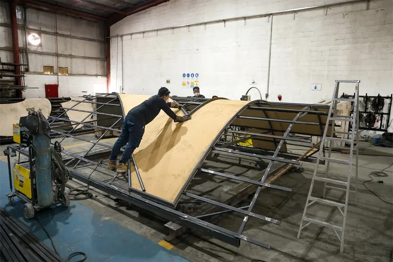 Evolution Scenic fabricators assembling a large bespoke scenic feature with complex geometry