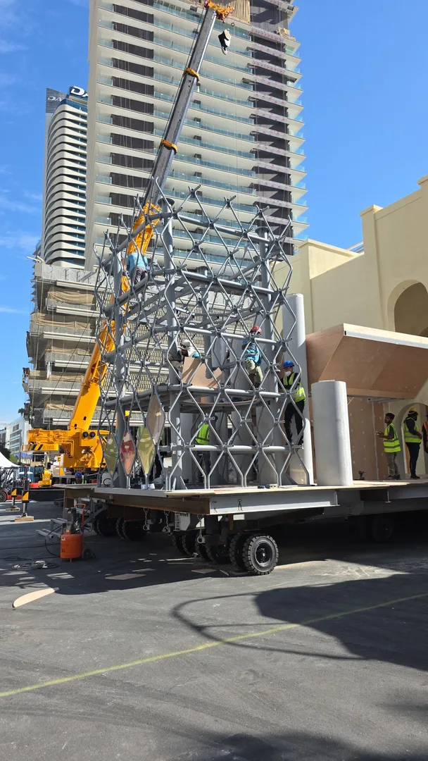 Tall mobile scenic frame engineered with low concentrated structural mass
