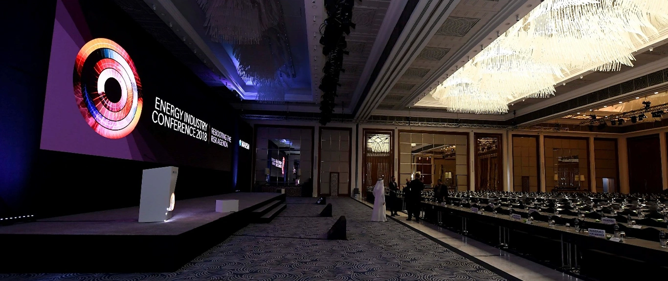 Evolution Scenic fabricated black conference stage backdrop and screen surround for Marsh in Dubai.