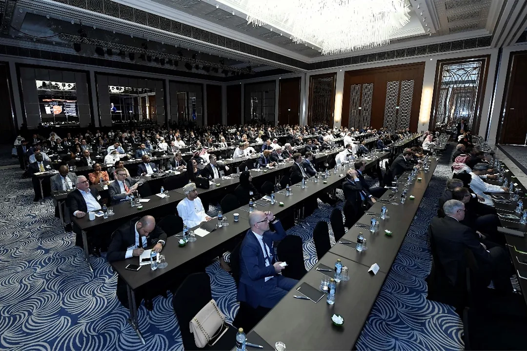 Branded lecterns positioned against the black scenic presentation backdrop at The Westin Dubai.