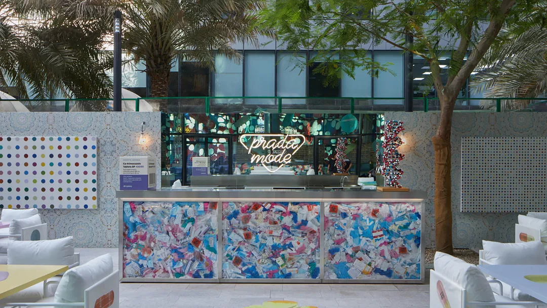 Custom outdoor counters fabricated to continue the Prada Mode visual language.
