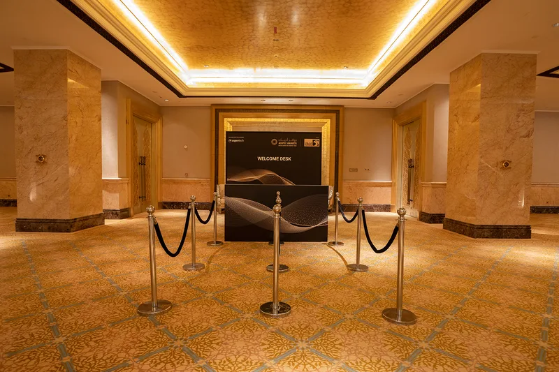 Branded registration environment fabricated by Evolution Scenic for guest  arrivals. 