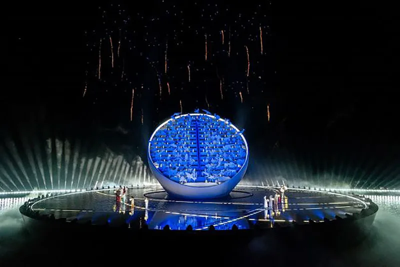 Telescopic lightbox buildings with individually controlled internal LED lighting.