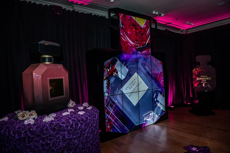 MDF-clad senic desk with integrated LED screen created for the Victoria's  Secret perfume launch.