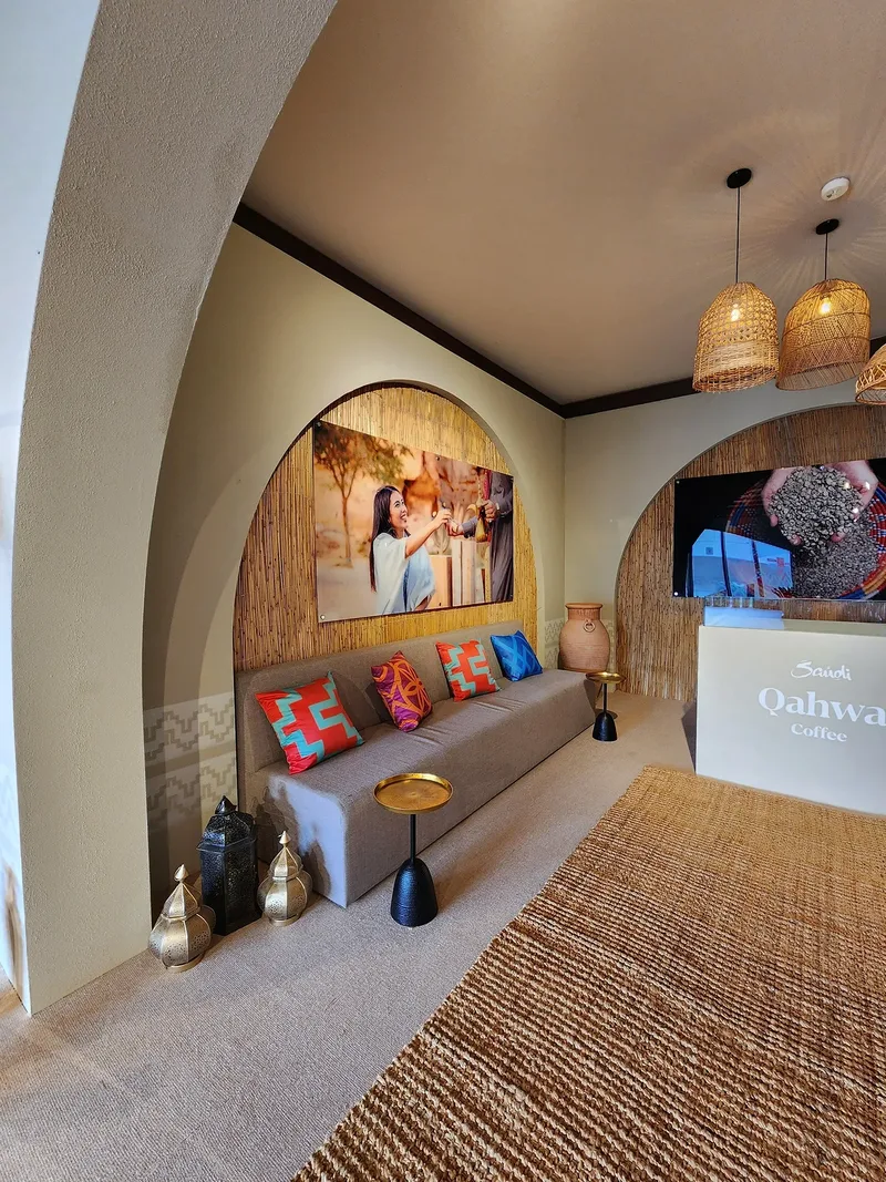 Evolution Scenic MDF-clad walls with textured paint and Visit Saudi vinyl graphics.
