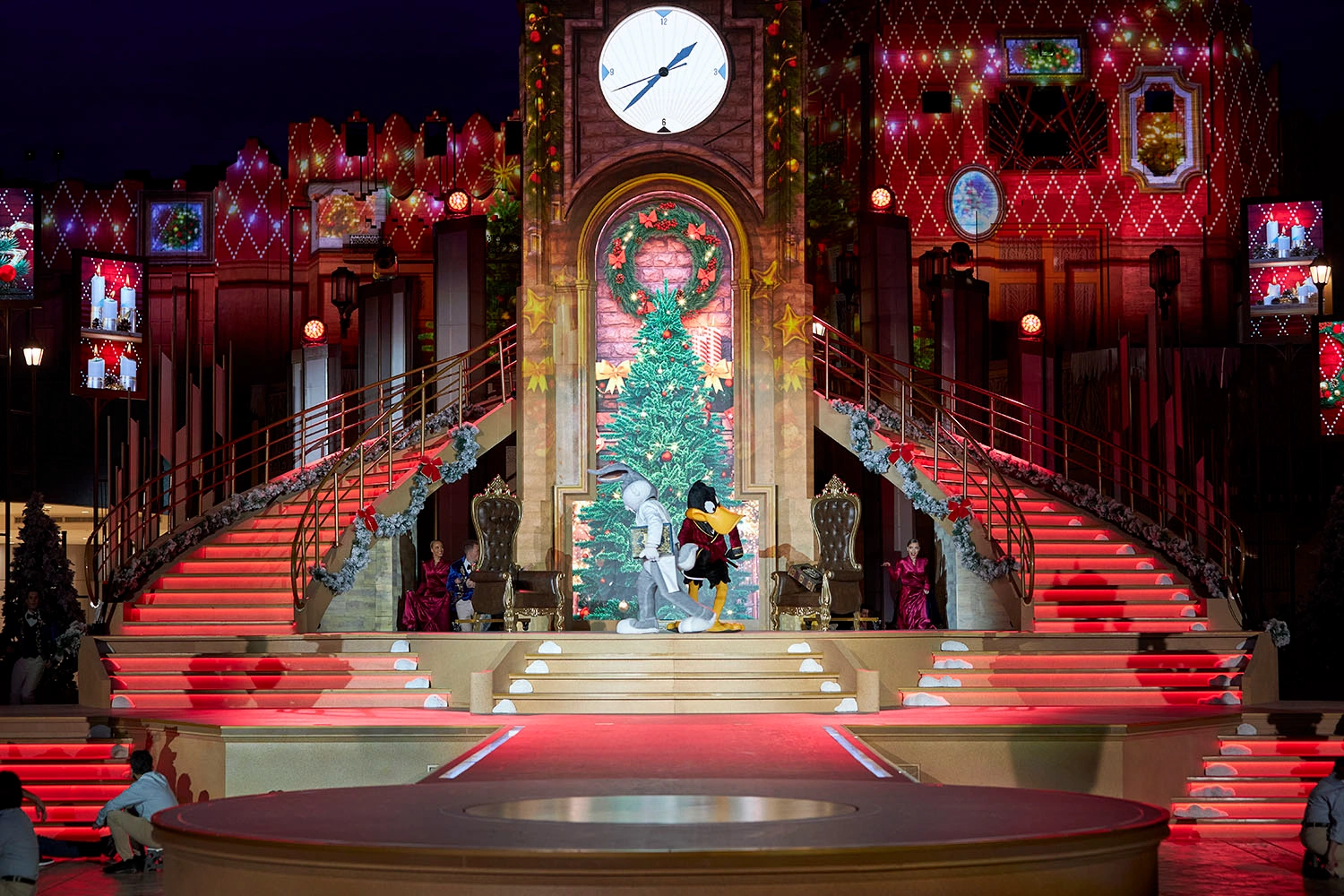 Evolution Scenic illuminated Art Deco stage with clock tower, staircases and integrated video displays.