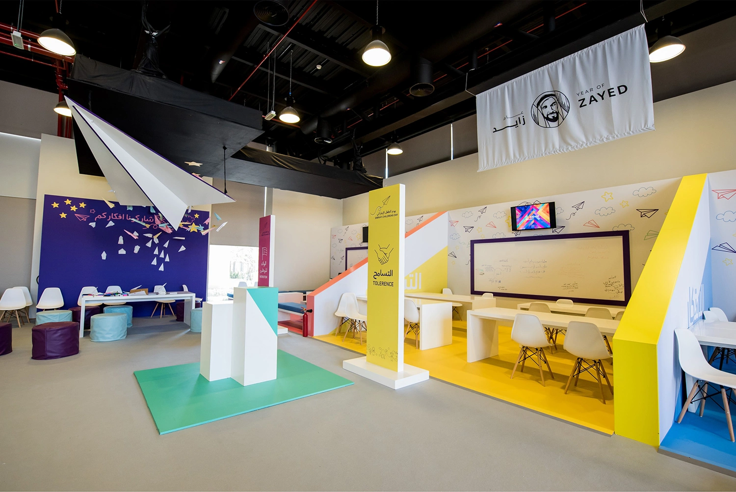 Evolution Scenic fabricated walls, backdrops and signage unifying indoor and outdoor spaces.