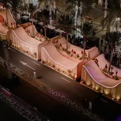 desert-themed-parade-float-night-event.webp