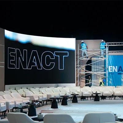 enact-conference-stage-production-setup.webp