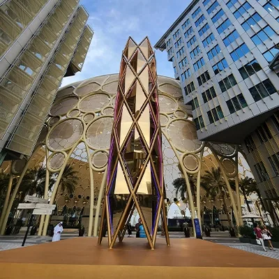 outdoor-cultural-event-pavilion-sculptural-entrance.webp