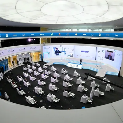 inpex-conference-presentation-stage-delegate-seating.webp
