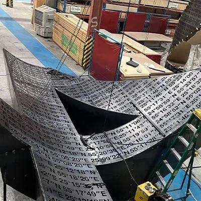 curved-perforated-metal-panel-workshop.webp