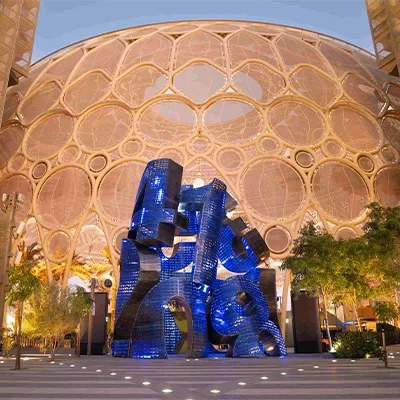 illuminated-metal-sculpture-night-installation.webp