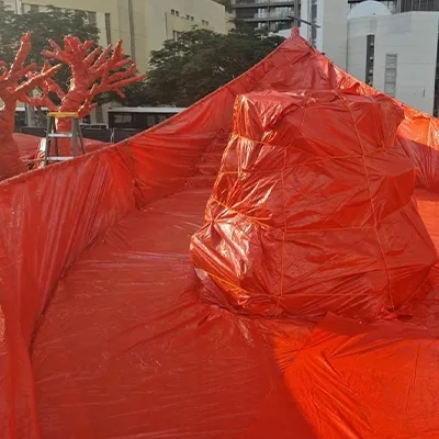 red-wrapped-scenic-tree-transportation.webp
