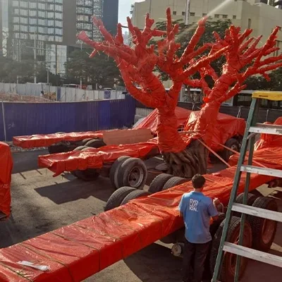 red-sculpted-tree-flatbed-trailer.webp