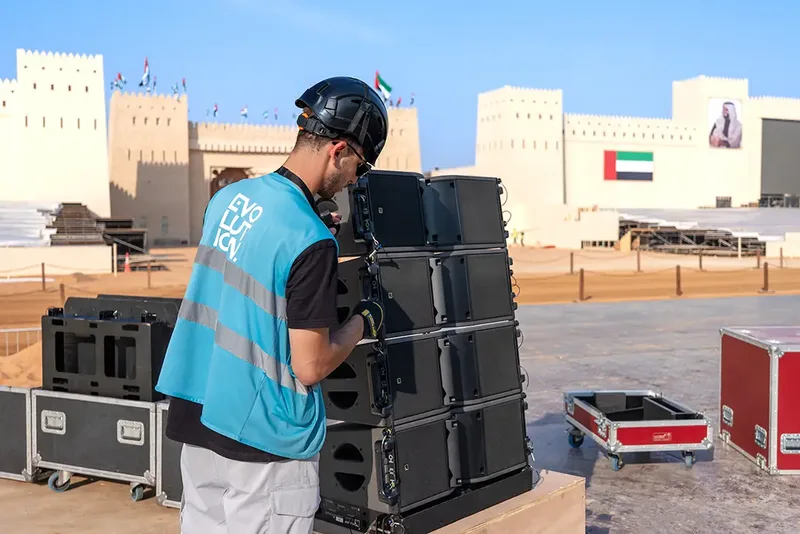 Evolution Site crew handling event production equipment
