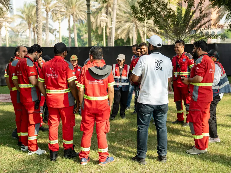 Event workforce receiving an on-site safety briefing